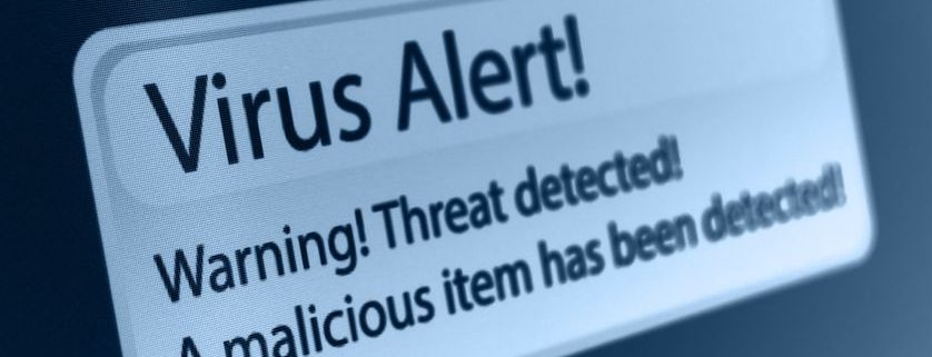 A close up of an image on a computer screen displaying the text Virus Alert.